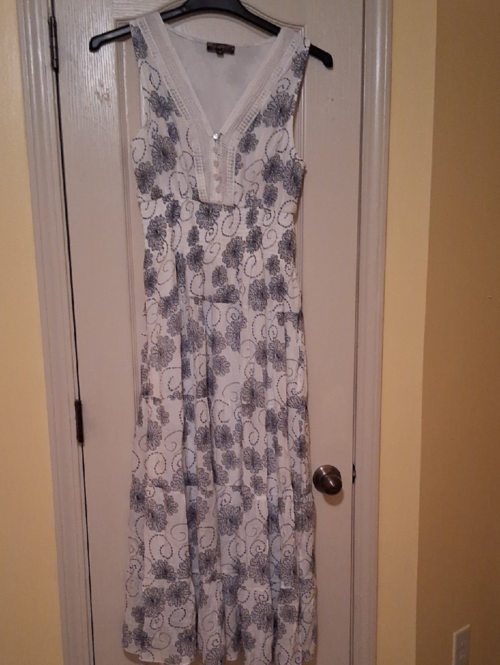 Sleeveless White Maxi Dress with Gray Floral Print